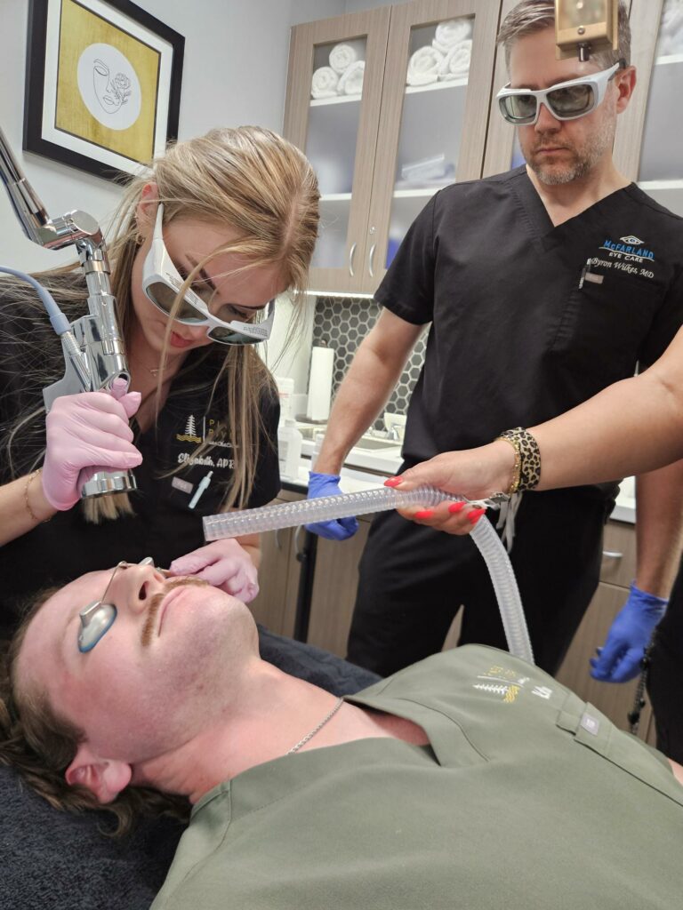 Pine & River Aesthetics team participating in hands-on laser treatment training in Little Rock, Arkansas.